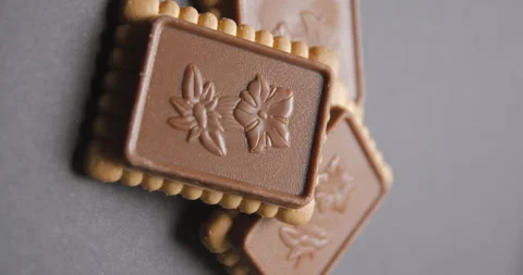 Biscuits with chocolate tablet rotating, vertical Stock Footage 242301894