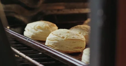 Biscuits cooking in oven Stock Footage 293339004