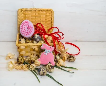 Biscuits Easter Bunny and egg in a basket of quail egg Stock Photos
