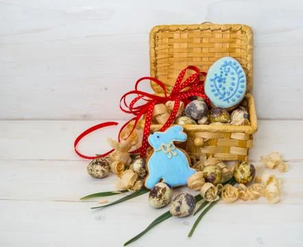 Biscuits Easter Bunny and egg in a basket of quail egg Stock Photos