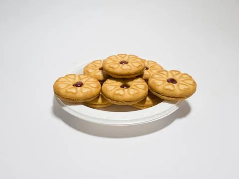 Biscuits filled with strawberry jam Stock Photos