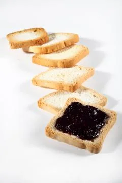 Biscuits with jam on white background Stock Photos