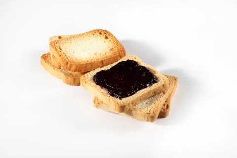 Biscuits with jam on white Stock Photos