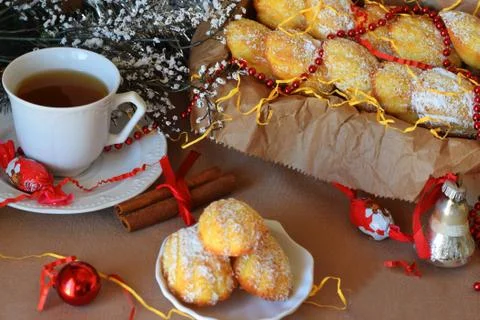 Biscuits Madeleine with orange, dusted with sugar powder. Stock Illustration
