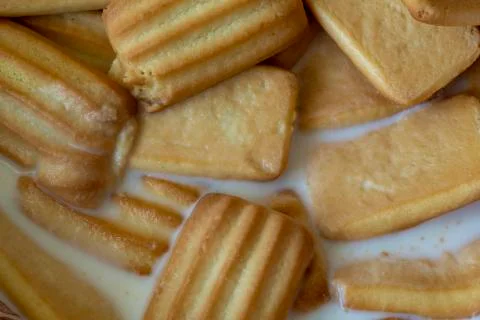 Biscuits in milk 스톡 사진