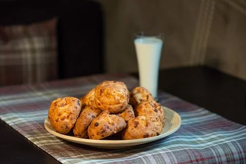 Biscuits with milk on the table in a cafe Stock Photos