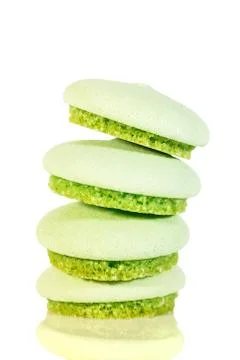 Biscuits or macarons stack, isolated on white background, green color 스톡 사진