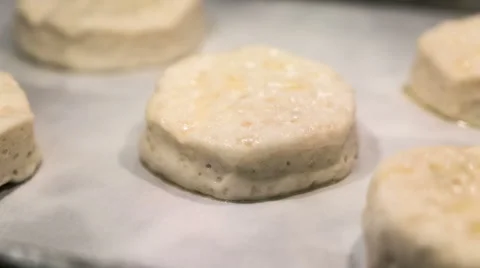 Biscuits rising in oven time-lapse video. Stock Footage