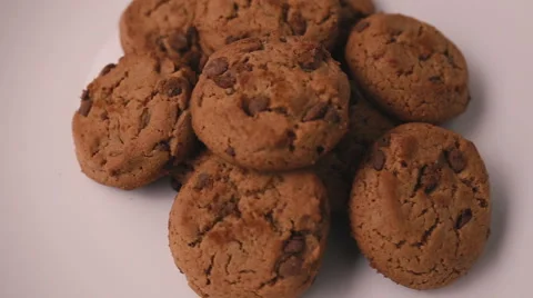 Biscuits spinning on a plate spinning Stock Footage 56808555