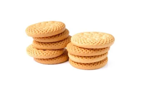 Biscuits, A stack of delicious wheat round biscuits with a few crumbs isolate Stock Photos