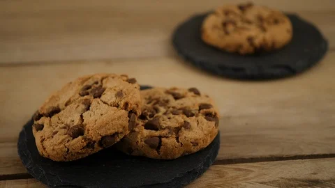 Biscuits with stone-based chocolate with rustic background. Focus transition Video stock 92815319