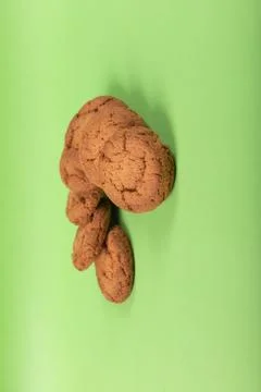 Biscuits on table with green background Stock Photos