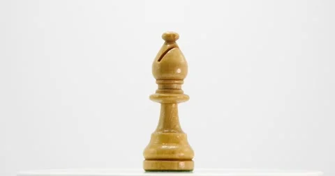 Bishop chess piece spinning isolated on white Stock Footage 218412104