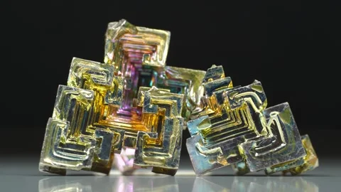 Bismuth crystals. Bismuth - chemical element with symbol Bi and atomic number 83 Stock Footage 331102177