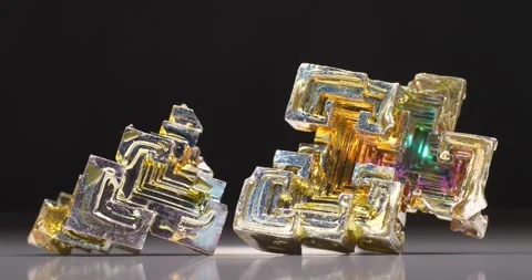 Bismuth crystals. Bismuth - chemical element with symbol Bi and atomic number 83 Stock Footage 331750543