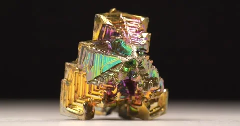 Bismuth crystals. Bismuth - chemical element with symbol Bi and atomic number 83 Stock Footage 333075564