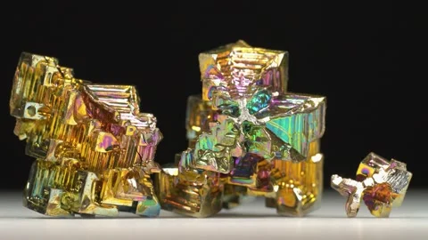 Bismuth crystals. Bismuth - chemical element with symbol Bi and atomic number 83 Stock Footage 333075603
