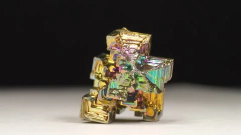Bismuth crystals. Bismuth - chemical element with symbol Bi and atomic number 83 Stock Footage 333574911