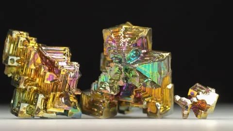 Bismuth crystals. Bismuth - chemical element with symbol Bi and atomic number 83 Stock Footage 334002435