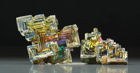 Bismuth crystals. Bismuth - chemical element with symbol Bi and atomic number 83 Stock Footage 335108676