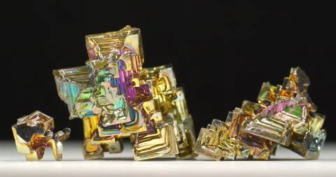 Bismuth crystals. Bismuth - chemical element with symbol Bi and atomic number 83 Stock Footage 339569837