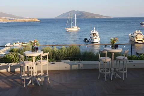 Bistro table with sea view Stock Photos