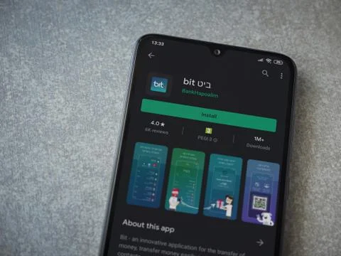 Bit app play store page on the display of a black mobile smartphone on cerami Stock Photos