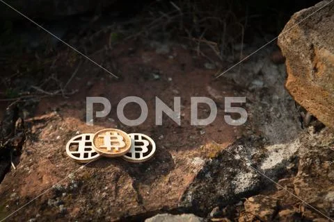 Bit Coin on old brick wall Stock Photos