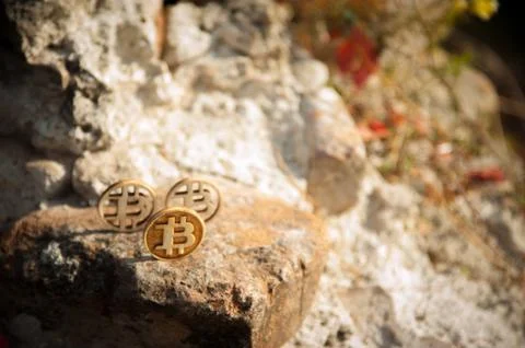 Bit Coin on old brick wall Stock Photos