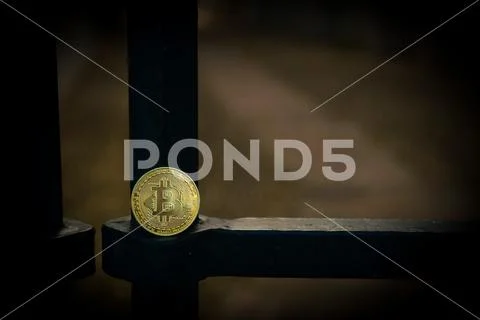 Bit coin on steel gate Stock Photos
