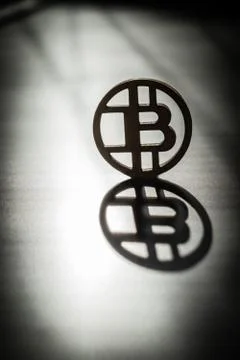 Bit coin with sunlight reflection on it 스톡 사진