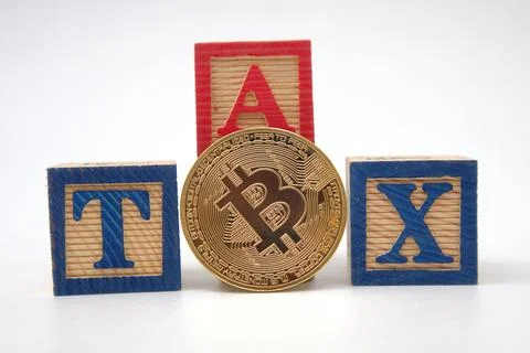 Bitcoin on 3 red blocks that say TAX on a white background. Crypto currency.. Stock Photos