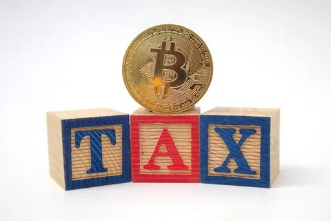Bitcoin on 3 red blocks that say TAX on a white background. Crypto currency.. Stock Photos