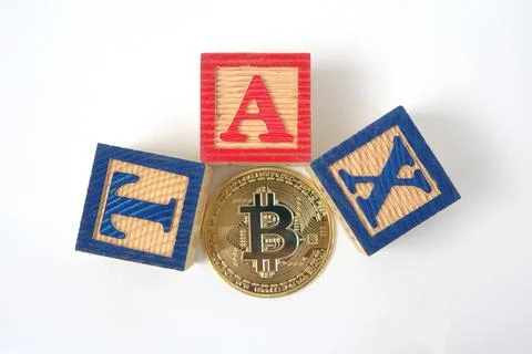 Bitcoin on 3 red blocks that say TAX on a white background. Crypto currency.. Stock Photos