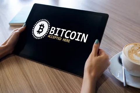 Bitcoin accepted here sign on screen. E-payment, Cryptocurrency and financial Stock-Fotos