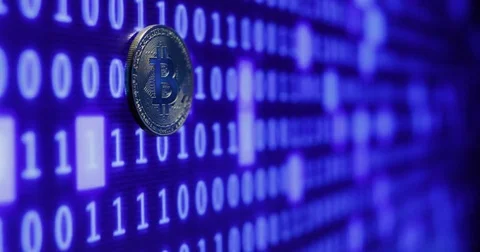 Bitcoin against monitor with binary code. Crypto currency Gold Bitcoins - BTC - Stock Footage 82913100