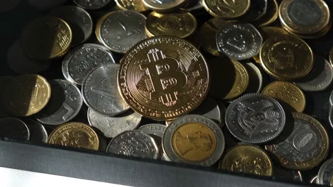 Bitcoin and coins of different countries. Stock-Footage 172143808