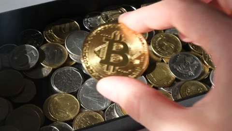 Bitcoin and coins of different countries. Stock Footage 172143863