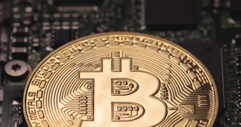 Bitcoin and computer circuit board Stock Footage 145374142