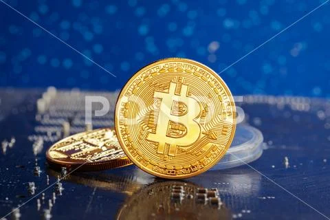 Bitcoin and a computer graphic card Stock Photos