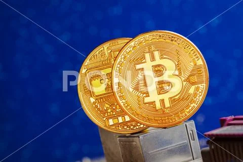 Bitcoin and a computer graphic card Stock Photos