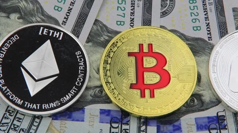 Bitcoin and cryptocurrency on banknotes of one hundred dollars. Video stock 100587300