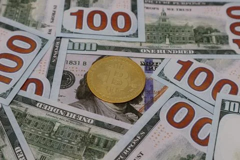 Bitcoin and dollar bill Stock Photos