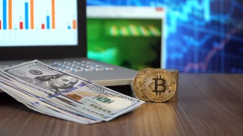 Bitcoin and Dollars Stock Footage 86781097