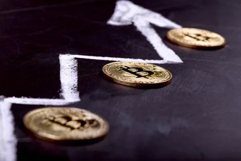 Bitcoin and graph Stock Photos