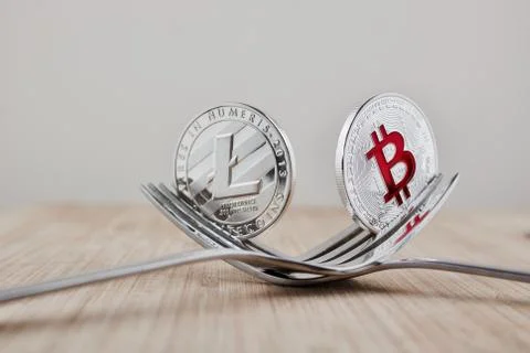 Bitcoin and Litecoin - Fork concept Stock Photos