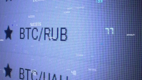 Bitcoin and other cryptocurrency prices changing. Closeup of cryptocurrency Stock Footage 100683404