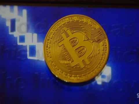 Bitcoin with animated chart in background Stock-Footage 83059386