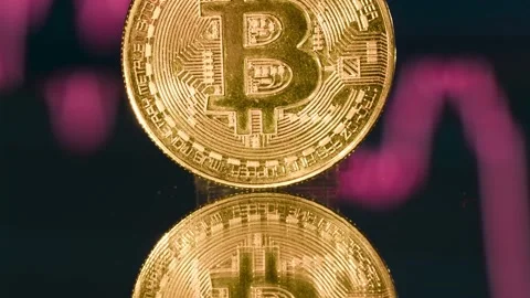 Bitcoin background and bitcoin chart. Cryptocurrency trading. Bitcoin graphic. Stock Footage 232107121