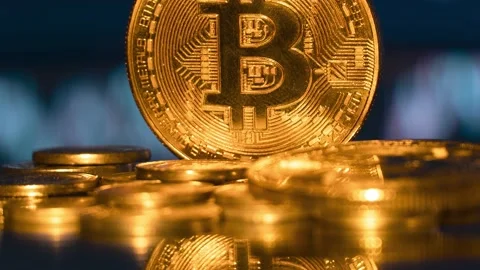 Bitcoin background and bitcoin chart. Cryptocurrency trading. Bitcoin graphic. Stock Footage 232107165